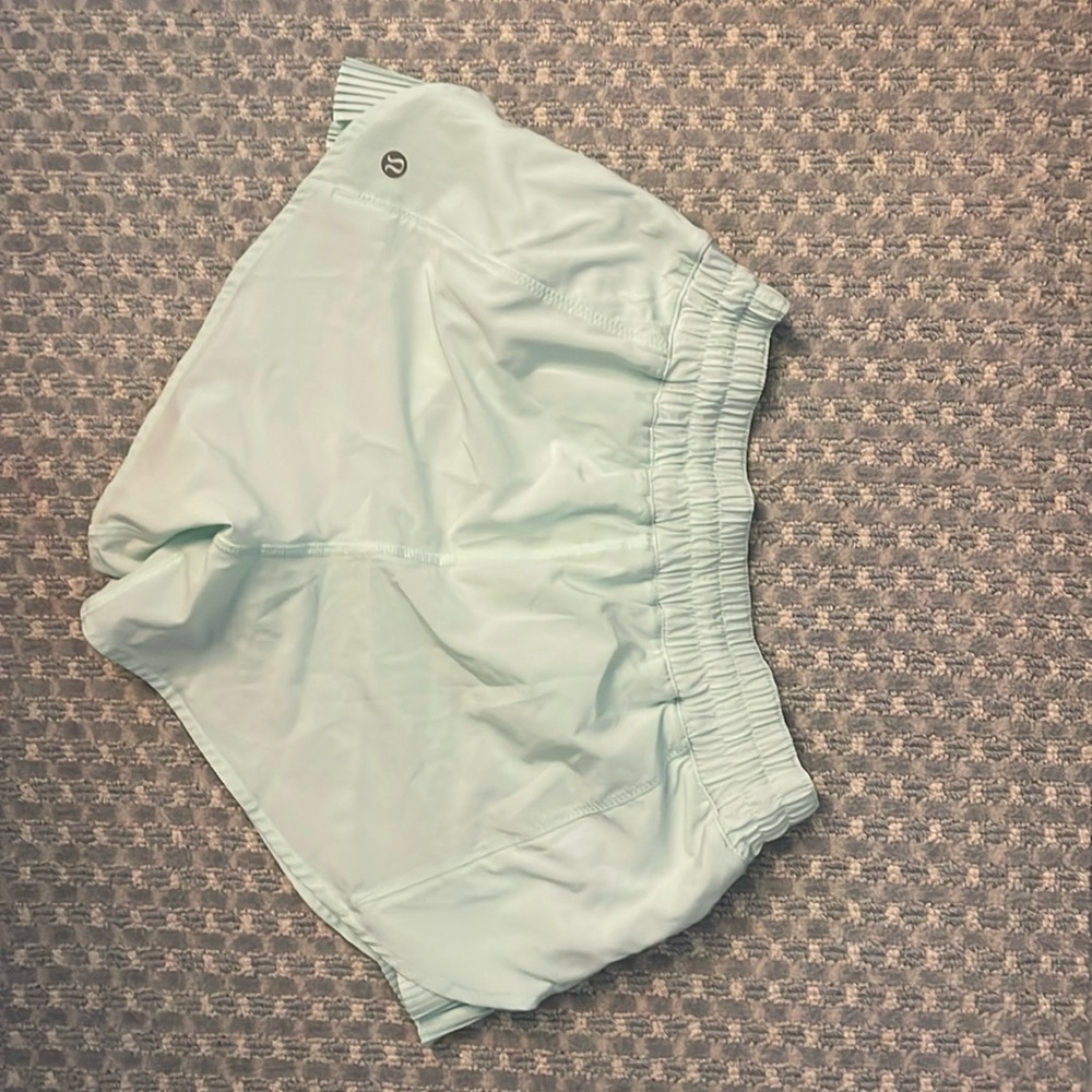 Lightly used light blue/green Lululemon shorts